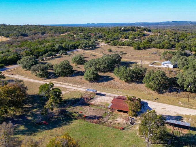 arial photo of a ranch for sale with building structures on Firefly Ranch in Bell county